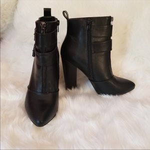 Black ankle boots with buckles and zipper